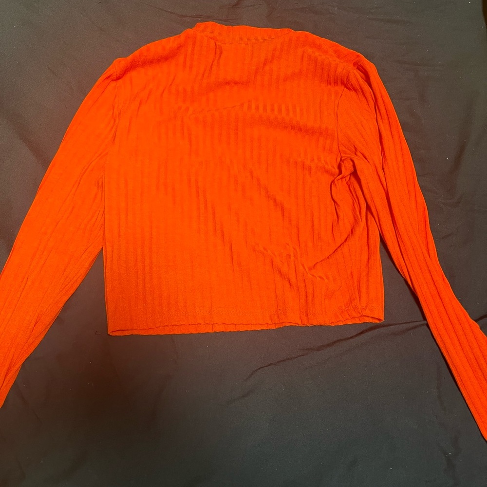 Orange turtle neck